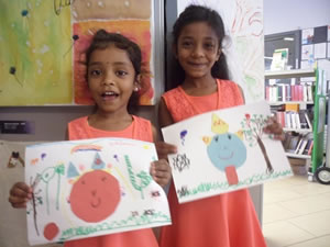 Artist sisters Kavinela and Kaninela Tharmakulasingam at Northolt Leisure Library