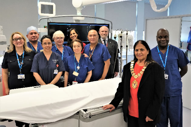 Cllr Mohinder Midha with the cath lab team