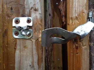 broken lock at apiary
