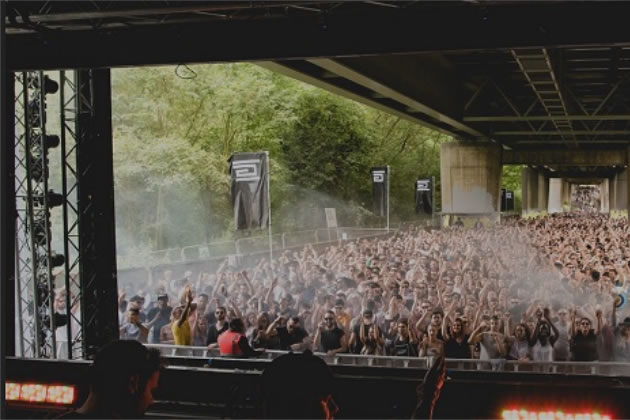 A previous Junction2 Festival under the M4 