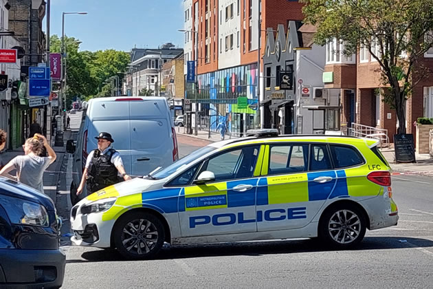 Police seal off the Uxbridge Road following the stabbing