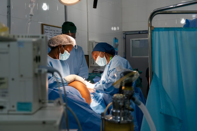 Sala Abdalla performing an operation in Ghana 