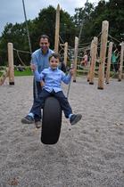 Councillor Bassam Mahfouz and son Alexander in the new children's playground at Walpole Park
