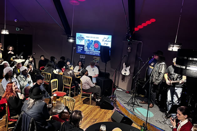 Seating is arranged communally to encourage conversation and connection