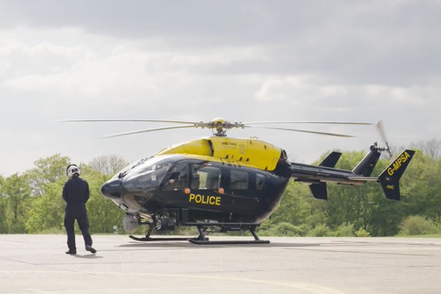 The police helicopter prepares to take off for Operation Pandilla